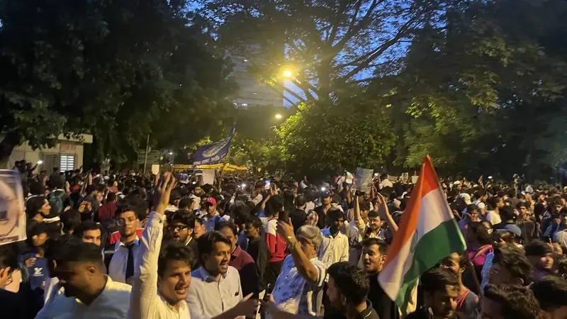 Protesters with the Indian flag at Jantar Mantar, New Delhi, in the evening